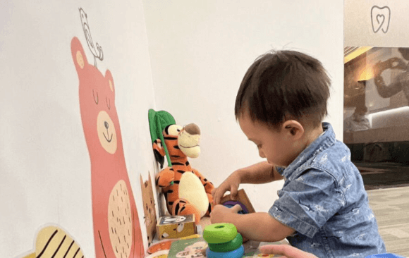 A toddler playing with toys